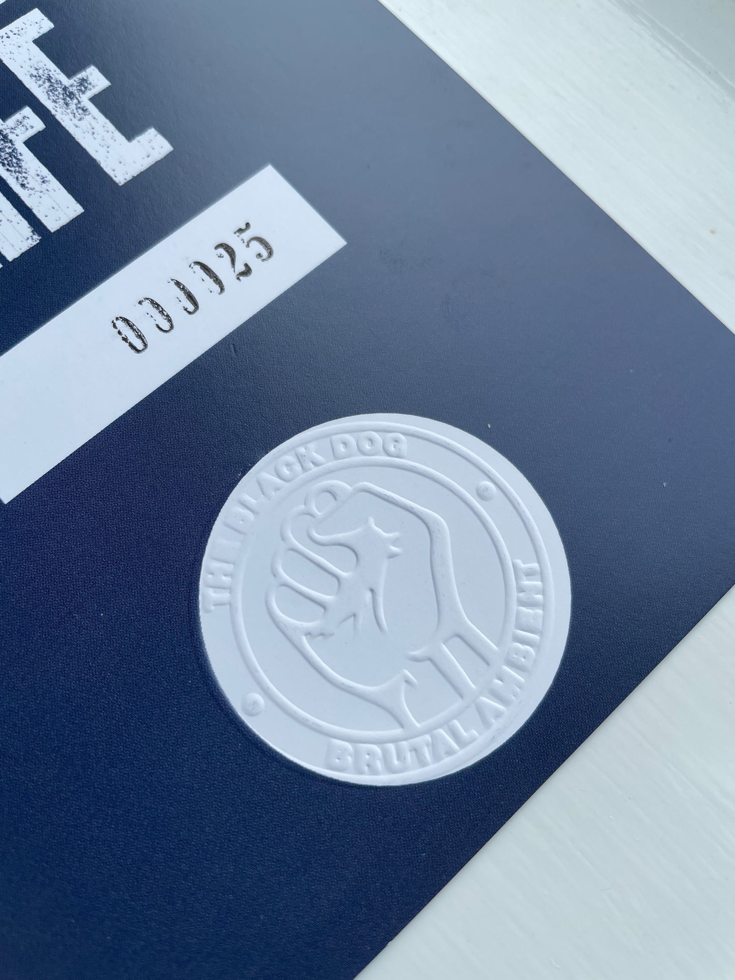 Embossed numbered card from the Deluxe CD Edition of Music For Moore Street Substation