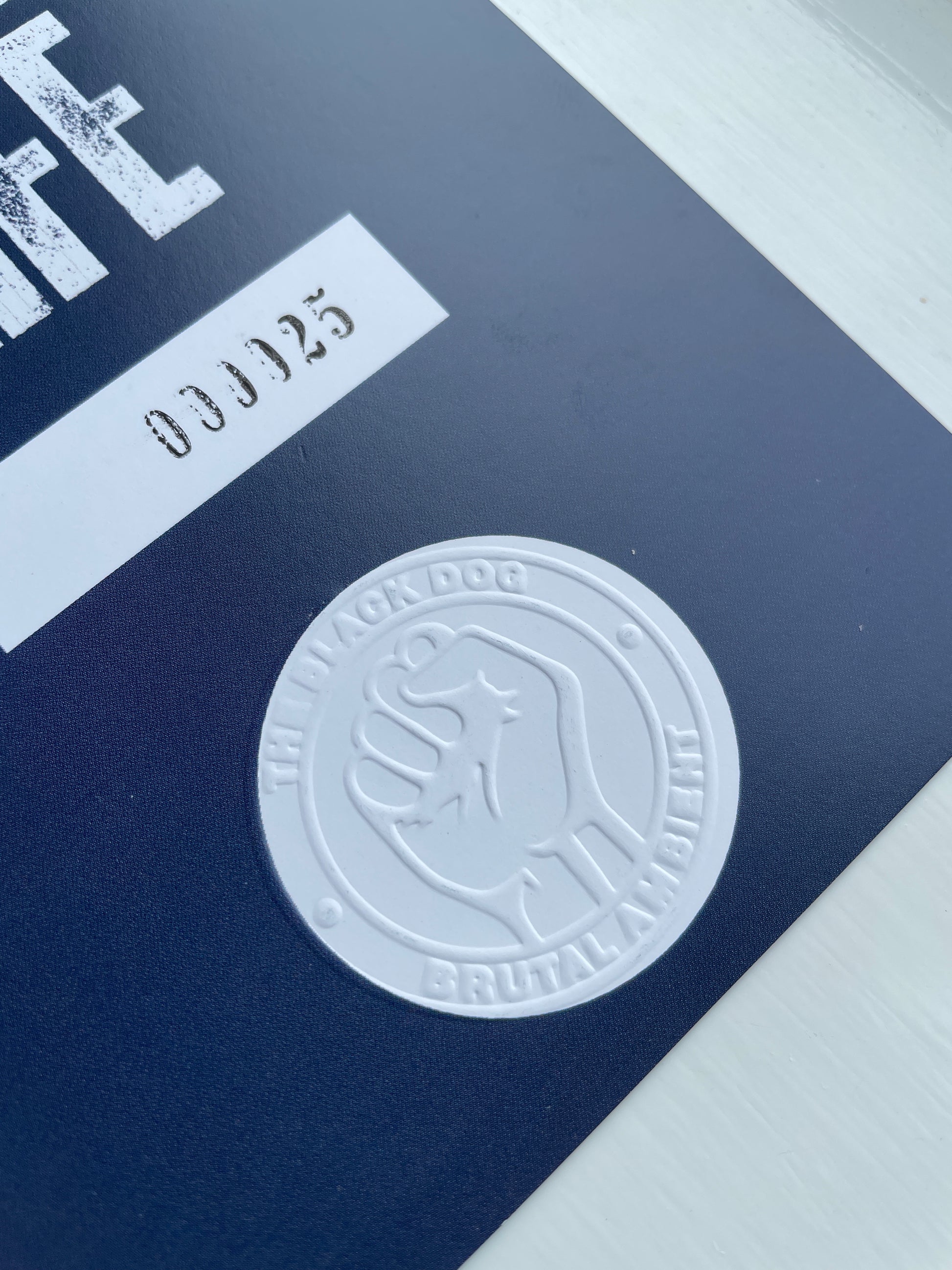 Embossed numbered card from the Deluxe CD Edition of Music For Moore Street Substation