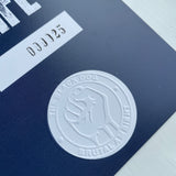 Embossed numbered card from the Deluxe CD Edition of Music For Moore Street Substation
